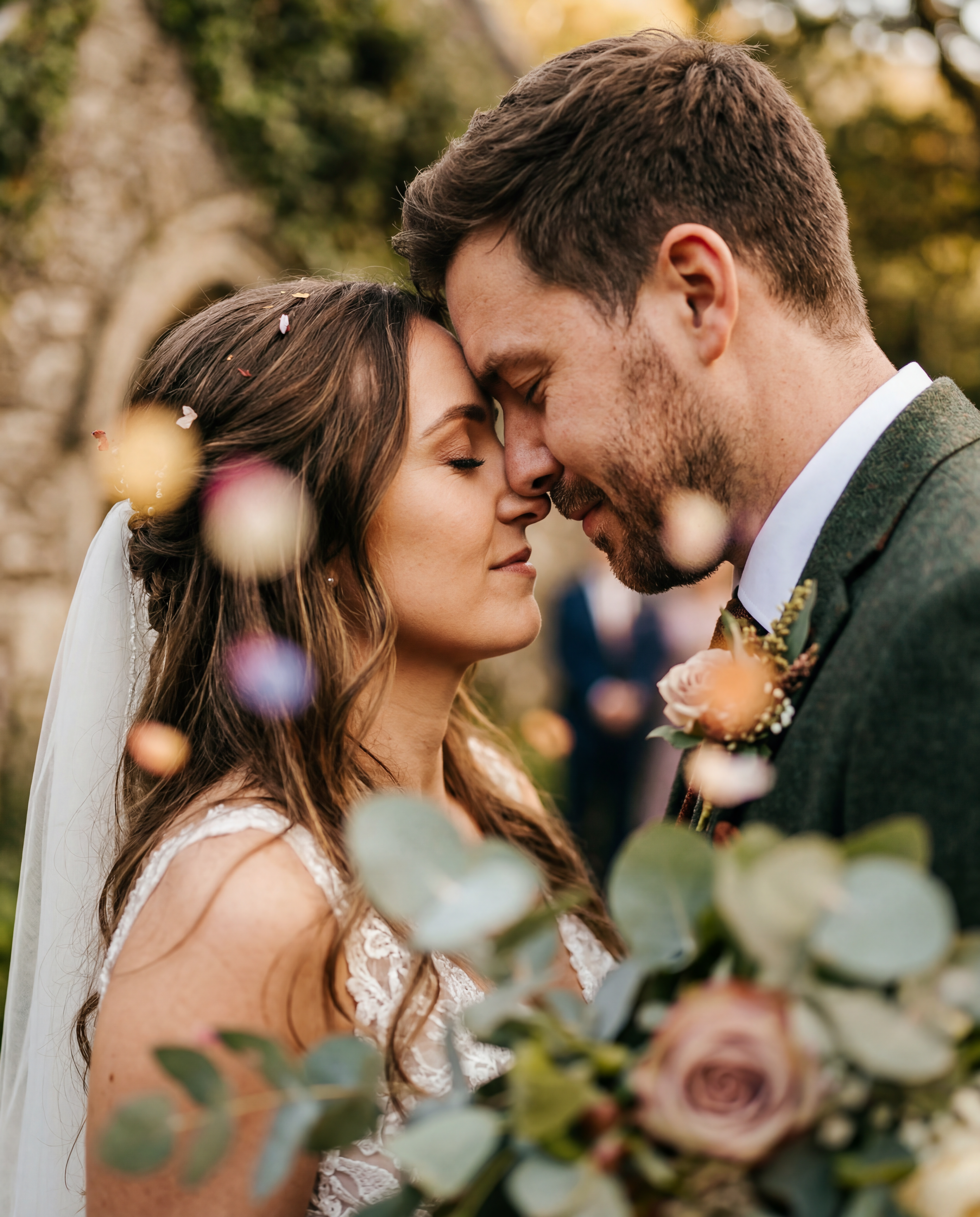 Bride and groom celebrating with families after wedding